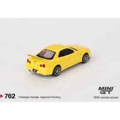 Nissan Skyline GT-R (R34) V-Spec - Gul 762 - Mini GT - 1:64