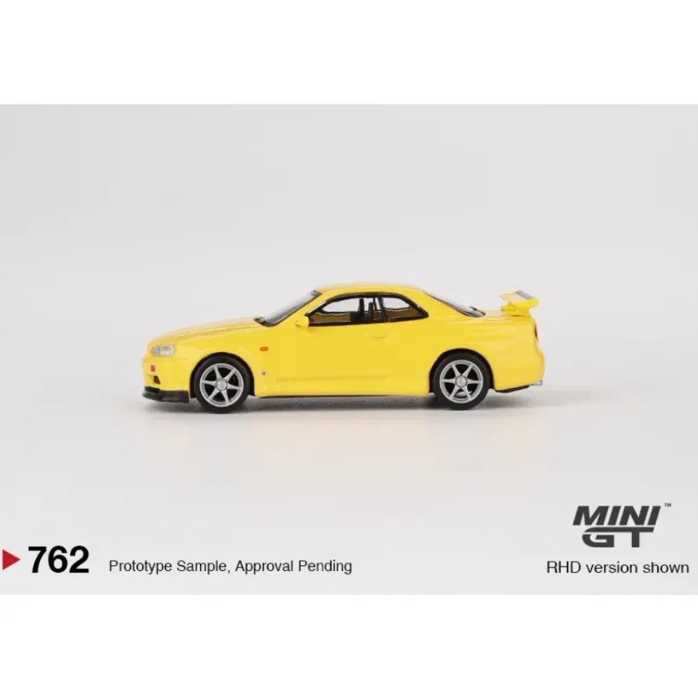 Nissan Skyline GT-R (R34) V-Spec - Gul 762 - Mini GT - 1:64